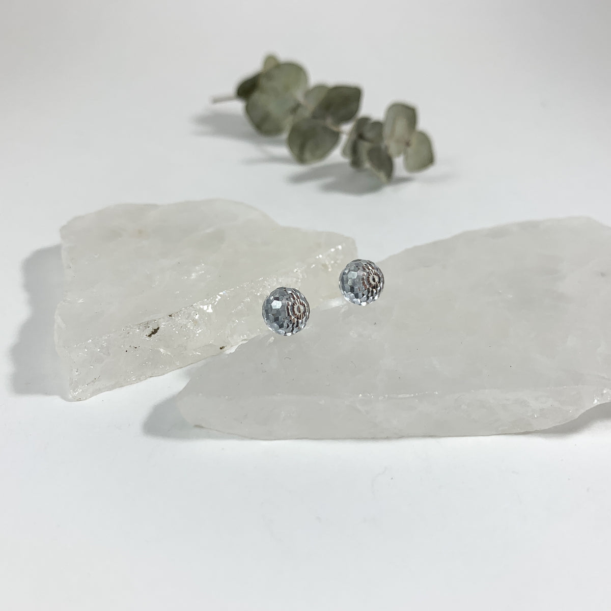 Crystal Clear disco stud earrings with 8mm faceted clear Austrian crystal on raw white crystal slabs with eucalyptus, classic sparkly stud earrings for sensitive ears by Blue Jeans and Pearls Saskatchewan