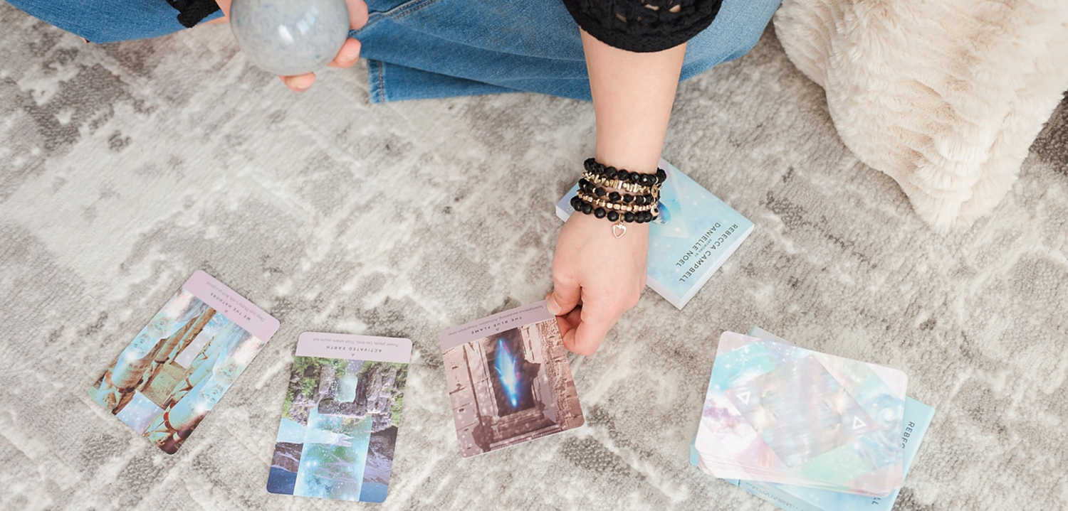 Woman wearing handmade gemstone bracelet stack designed by Blue Jeans and Pearls, Regina SK jeweler