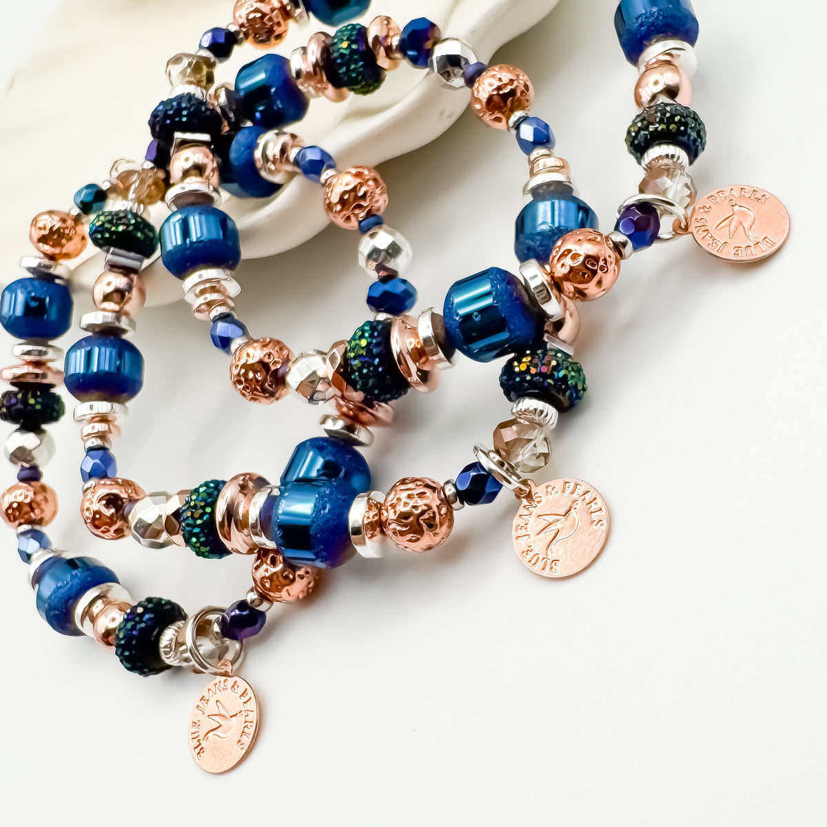Silver Horizon handmade mixed metal bracelet stack featuring electroplated hematite, Czech glass and rose gold beads with Blue Jeans and Pearls charms, bold statement jewelry by Blue Jeans and Pearls Saskatchewan