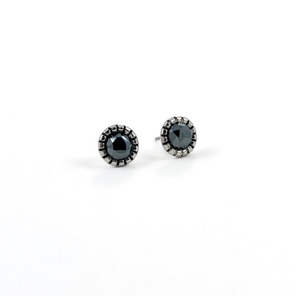Faceted Hemalyke stud earrings with 6mm mirror-like black gunmetal stones in scalloped bezel settings on white background, sleek black stud earrings by Blue Jeans and Pearls Saskatchewan